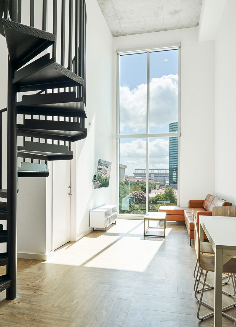 Interior apartment view with spiral staircase
